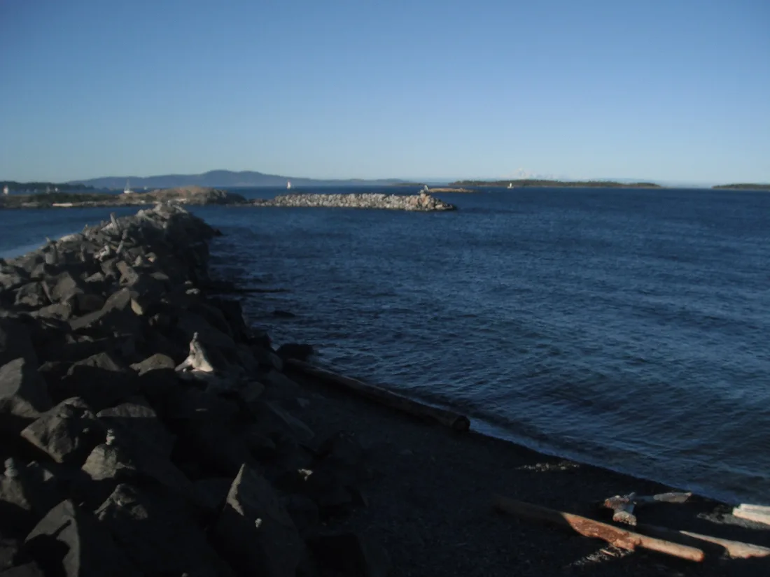 The breakwater and shoreline at Oak Bay near Victoria on a calm day