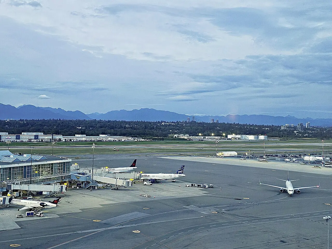 Exterior of Vancouver International Airport with the control tower and terminal buildings