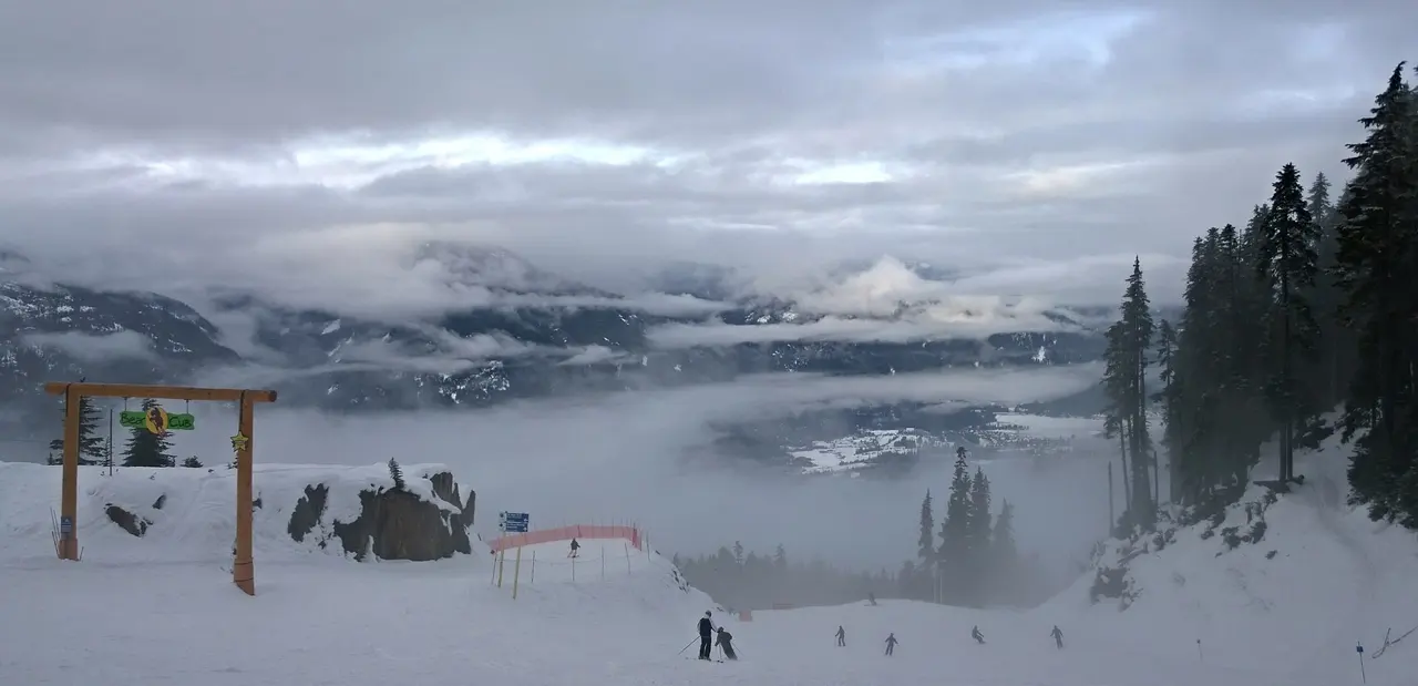 Cloud drifting through the high alpine bowls of Whistler Blackcomb