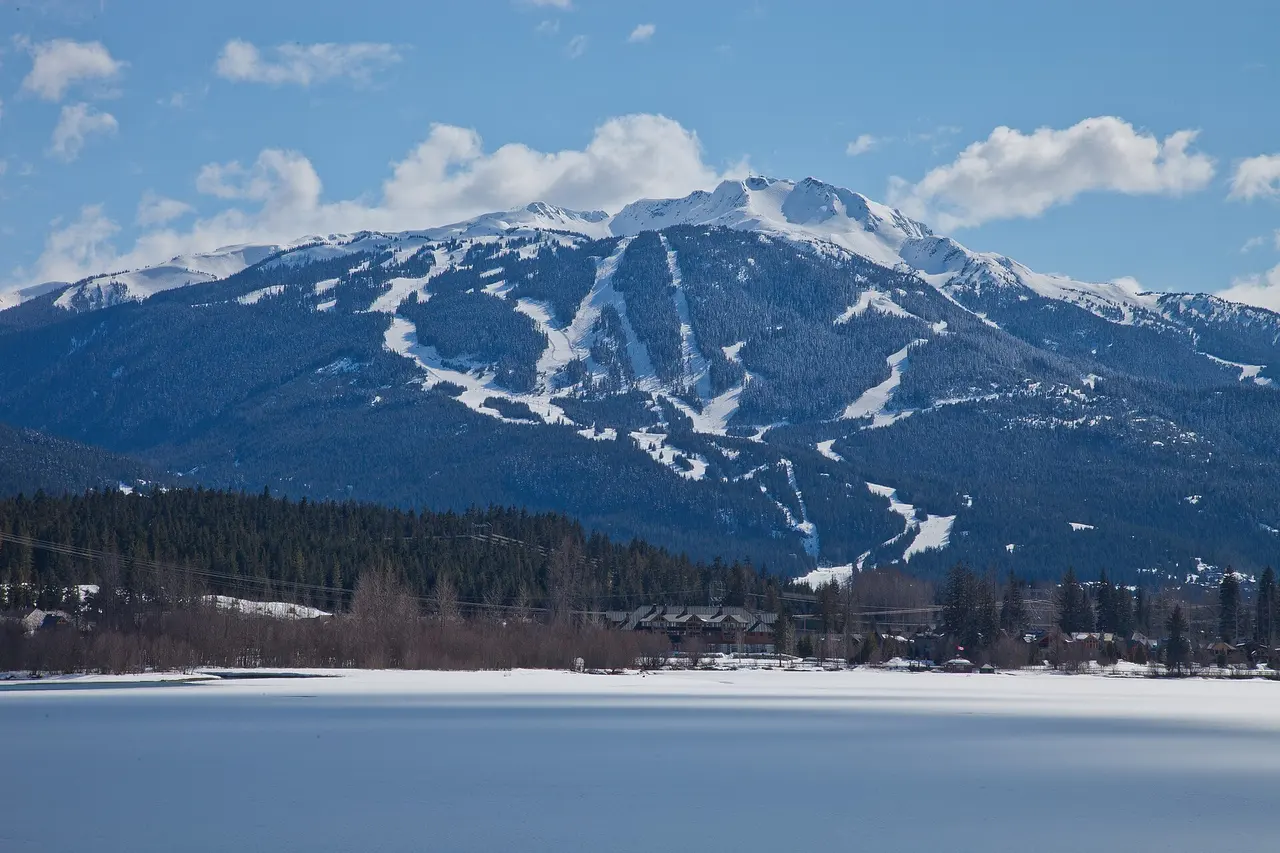 Whistler Mountain and the ski resort seen across Green Lake