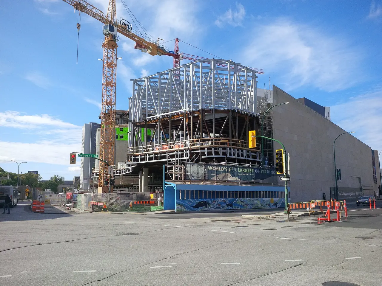 The curved white stone facade of Qaumajuq, the Inuit art centre at the Winnipeg Art Gallery