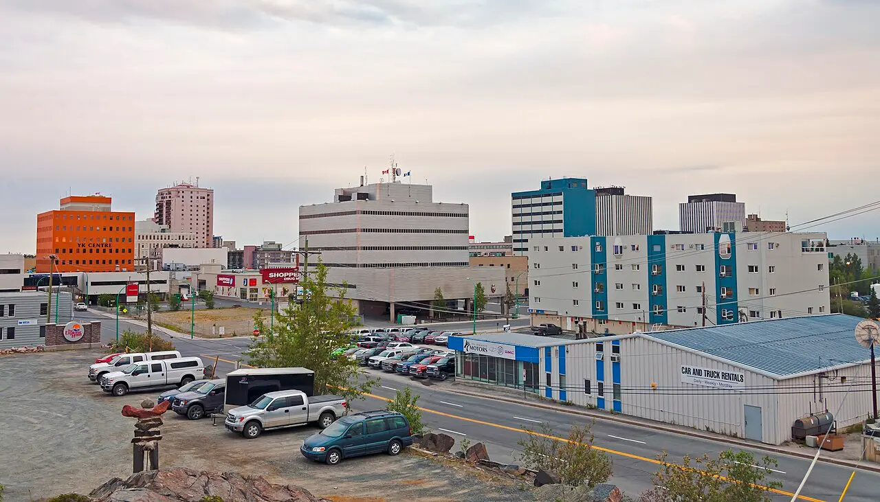 Downtown Yellowknife towers lit on a bright white-night evening