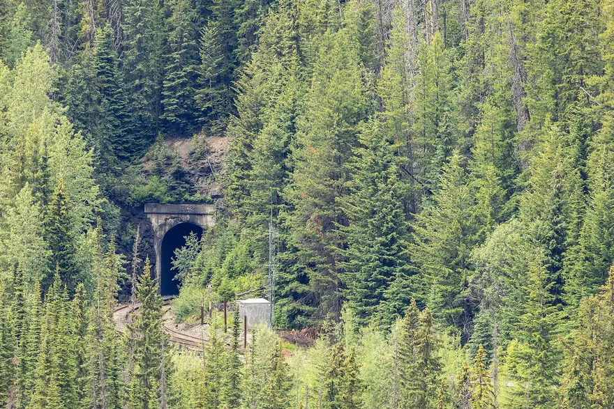 The lower portal of the Spiral Tunnels cut into the mountainside in Yoho